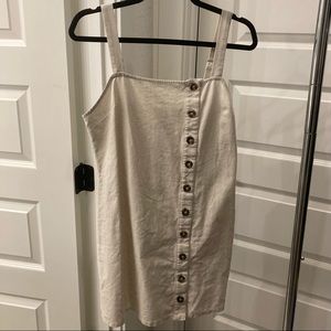 cream dress with zipper by sky and sparrow